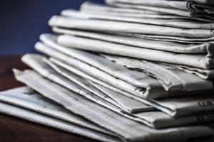 stack newspaper pile cropped